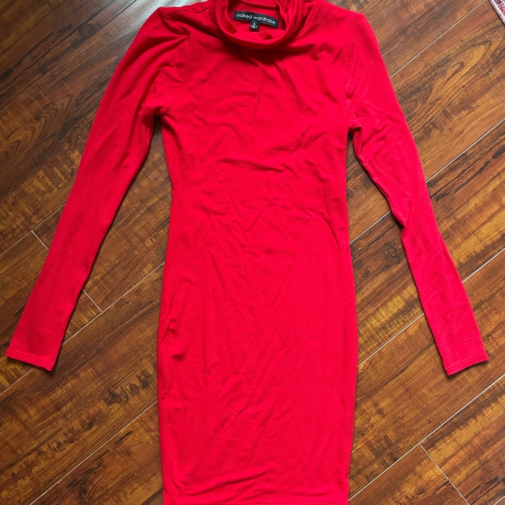 Short, form fitting, stunning turtle neck dress!